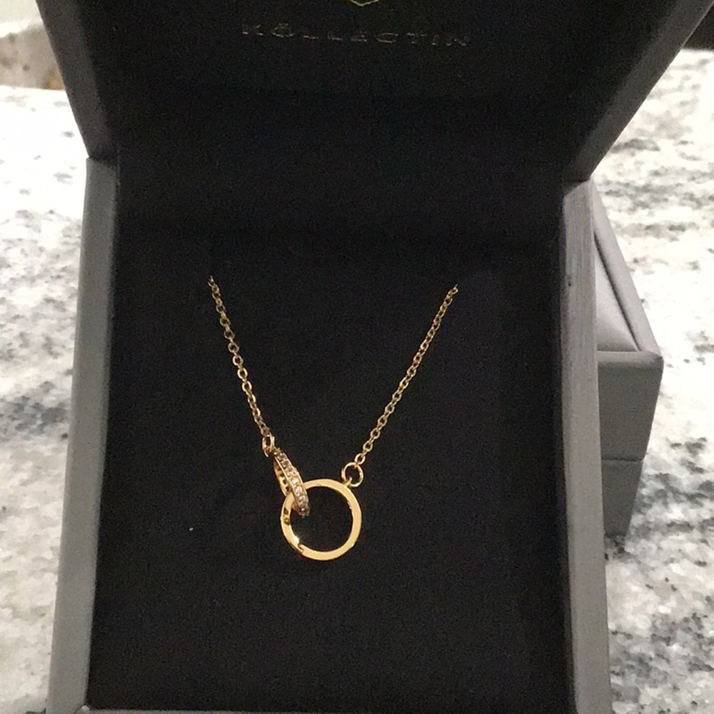 Brand new gold tone necklace with little stones